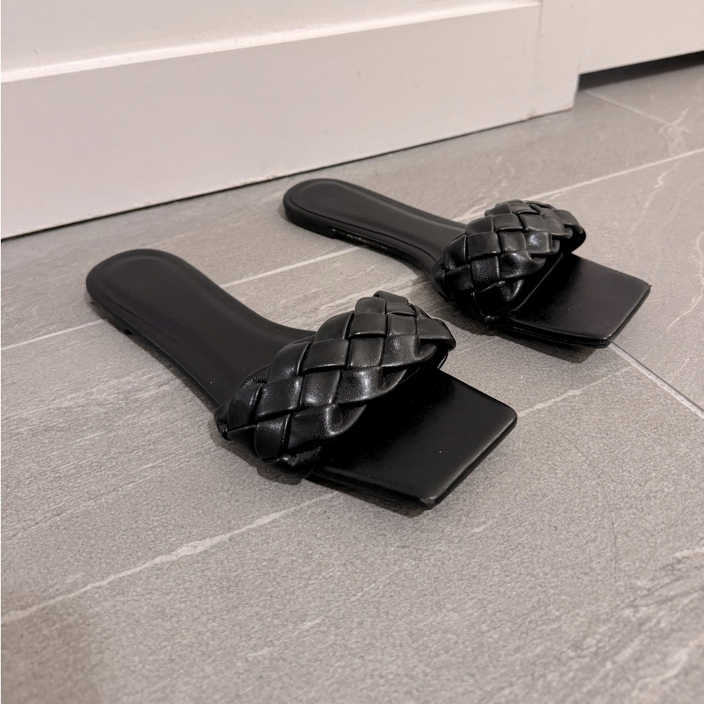Black leather braided sandals